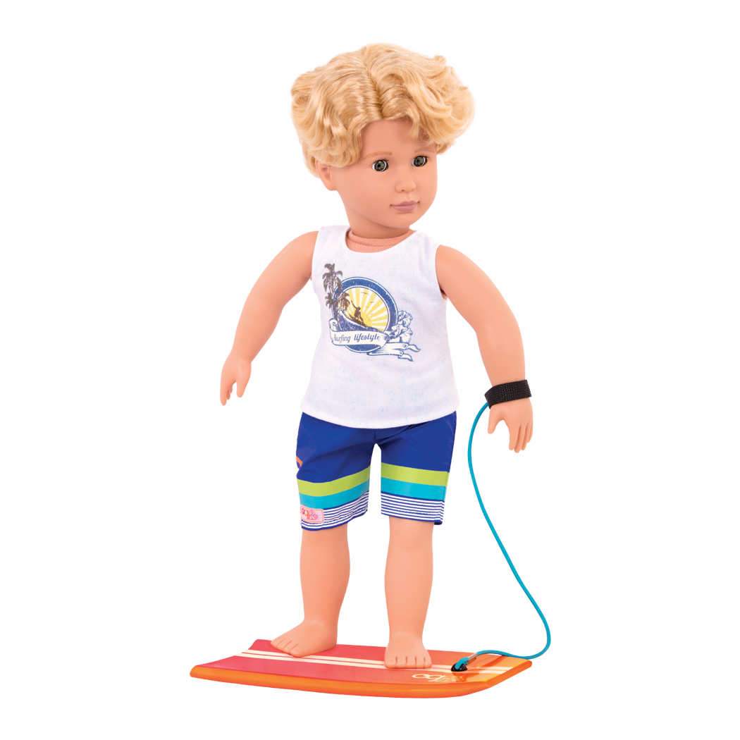 Gabe standing on surfboard
