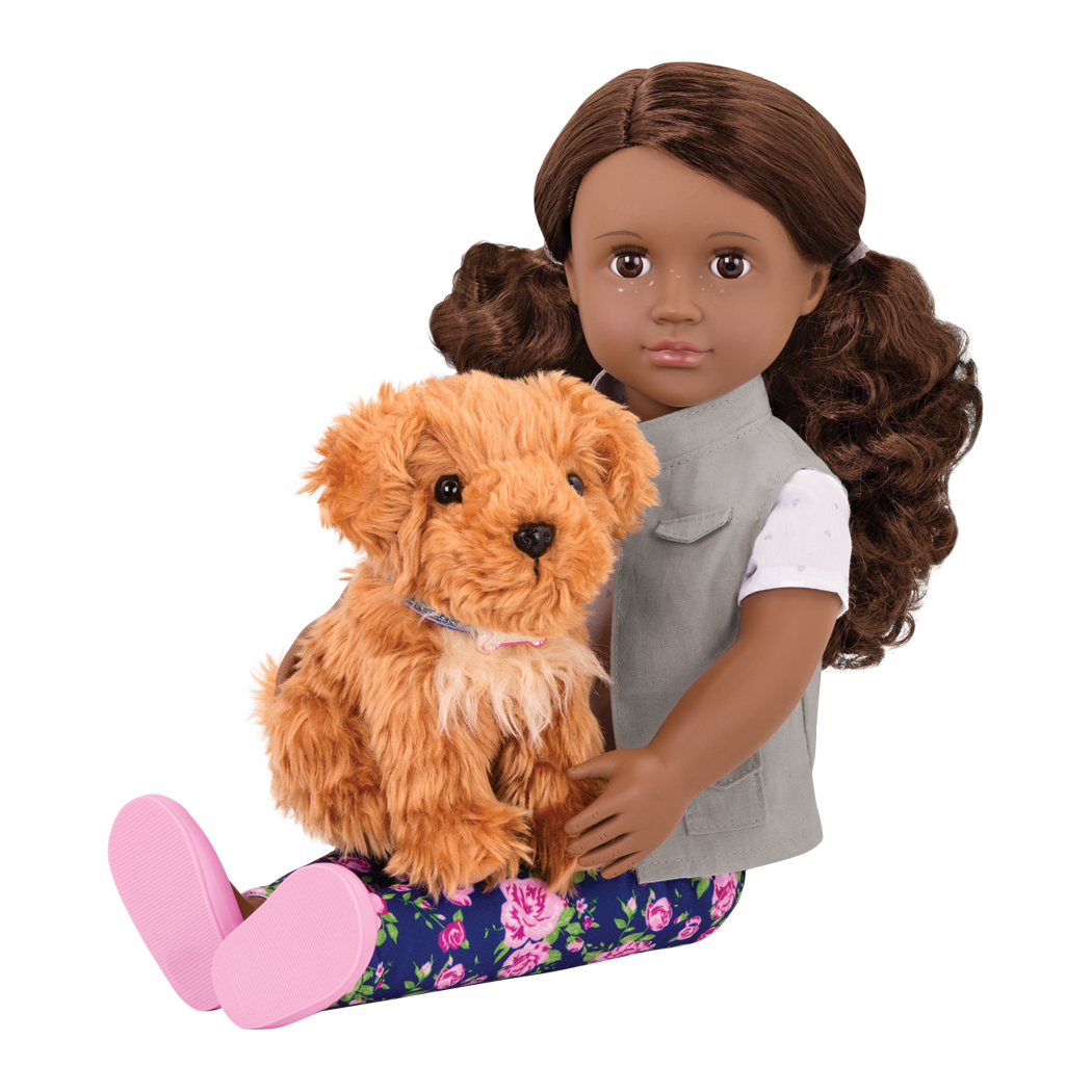 Malia sitting with Poodle in her lap