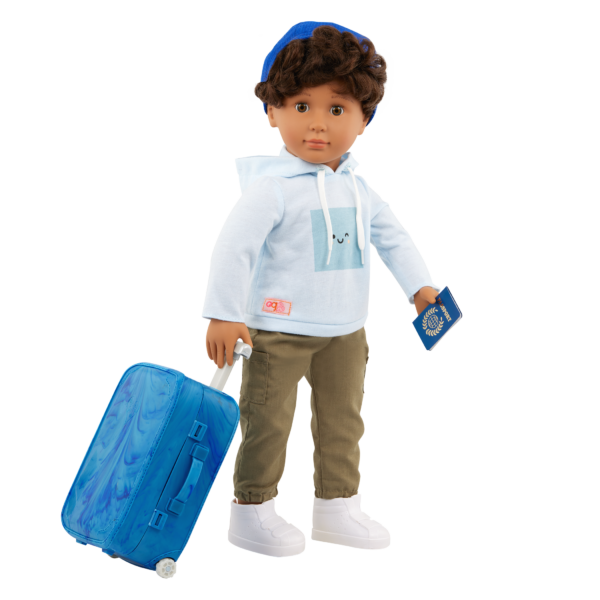 Our Generation 18 inch Doll Milo holding his suitcase and passport