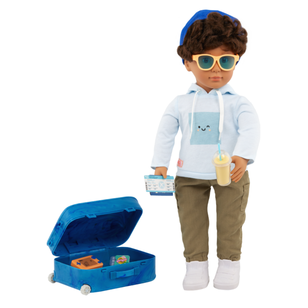 Our Generation 18 inch Doll Milo holding wearing sunglasses and holding a drink with his suitcase open