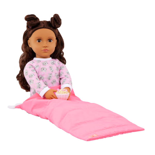 Our Generation 18 inch Doll Larissa sitting in a sleeping bag
