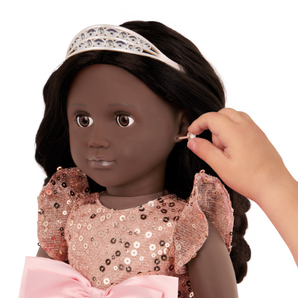 Child Putting Earrings on Our Generation Anniversary Doll Adira