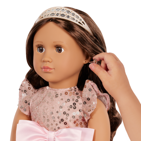 Child Putting Earrings on Our Generation Anniversary Doll Arya