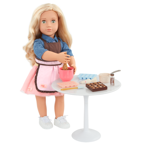 Our Generation 18-inch Doll Emily Mixing Chocolate on a Table with Accessories