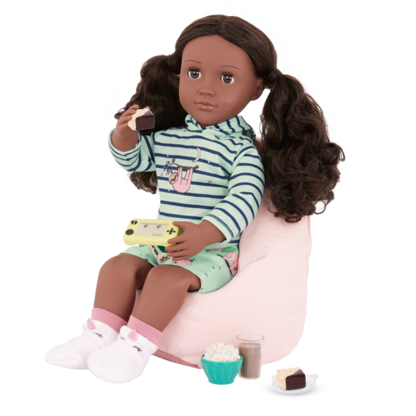 Our Generation Doll Sitting in the Bean Bag Chair with Accessories