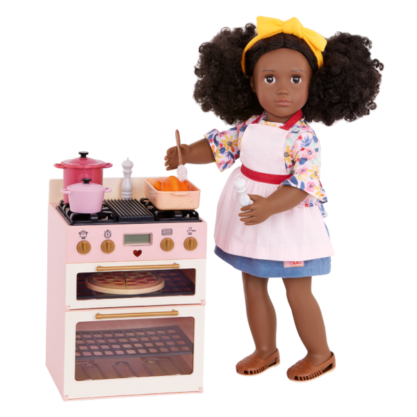Our Generation Doll Cooking on the Stove