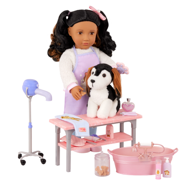 Our Generation 18 inch Doll grooming dog on table