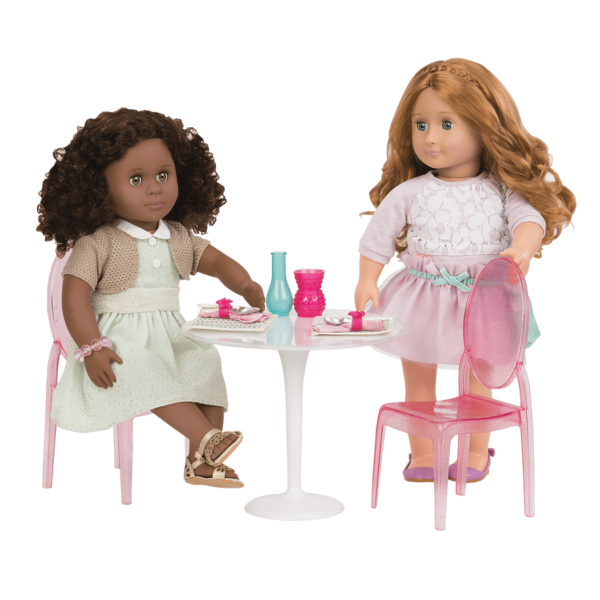 Nahla and Liana sitting at table