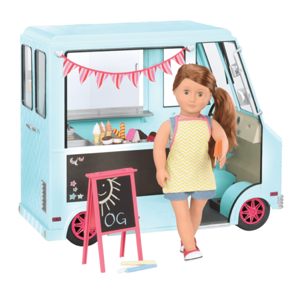 Adriana standing outside ice cream truck wearing apron