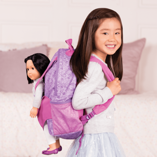Girl using Hop On Carrier Backpack - Purple Hearts