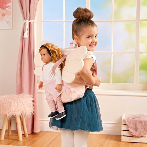 Child Wearing Our Generation Doll Carrier Backpack