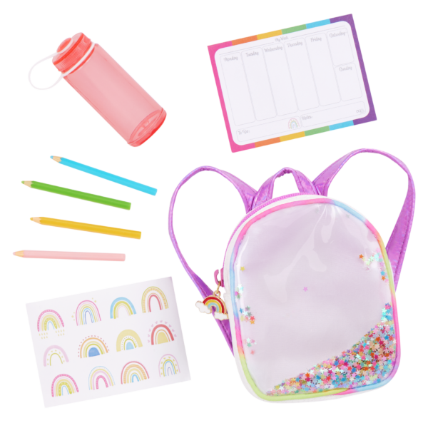Our Generation Doll Backpack with sparkly confetti and accessories including rainbow stickers, calendar, pencil crayons and a water bottle