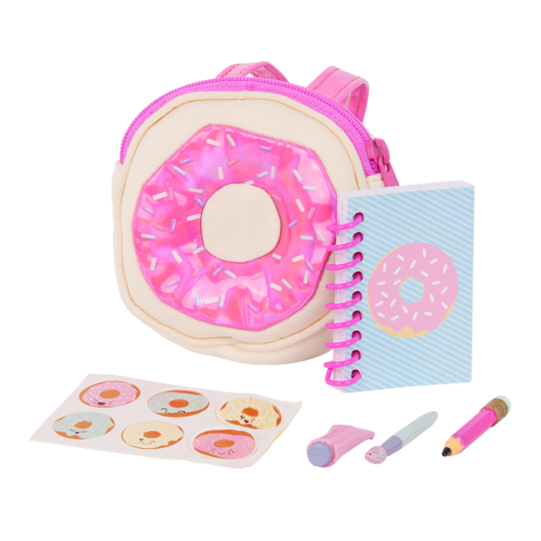 Our Generation Doll Donut Backpack and accessories including donut stickers, notebook, glitter tube and sponge and pencil